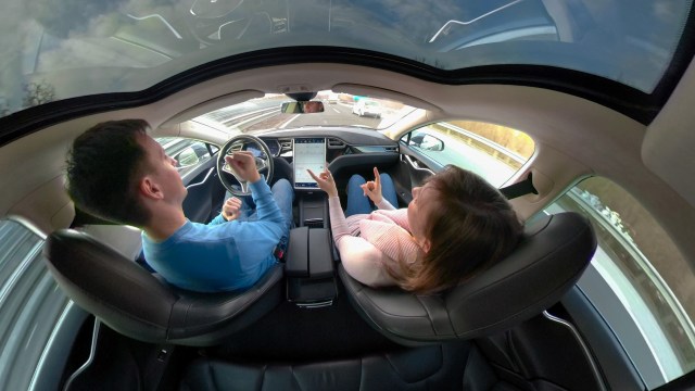 Couple in self-driving car