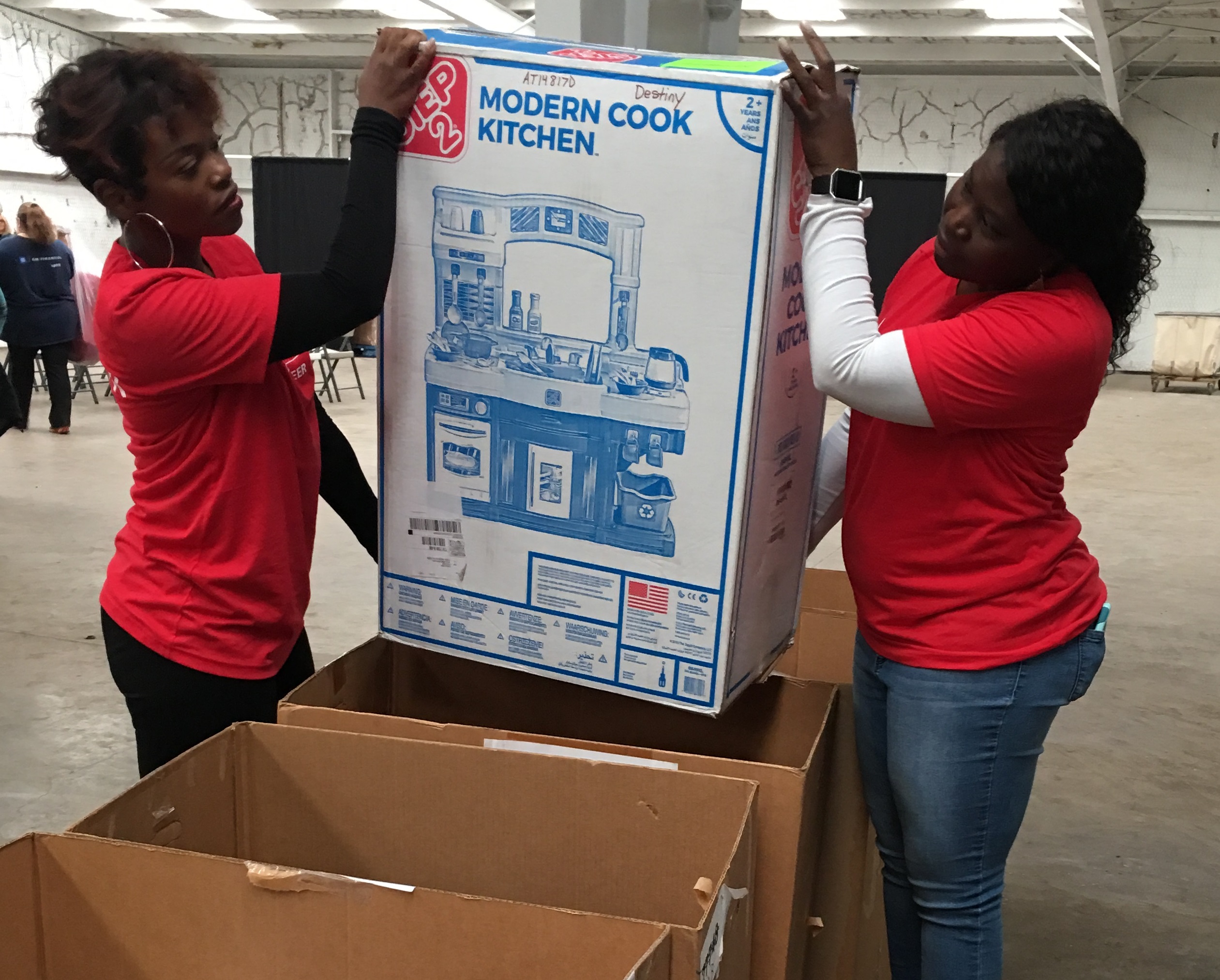 Women packing boxes