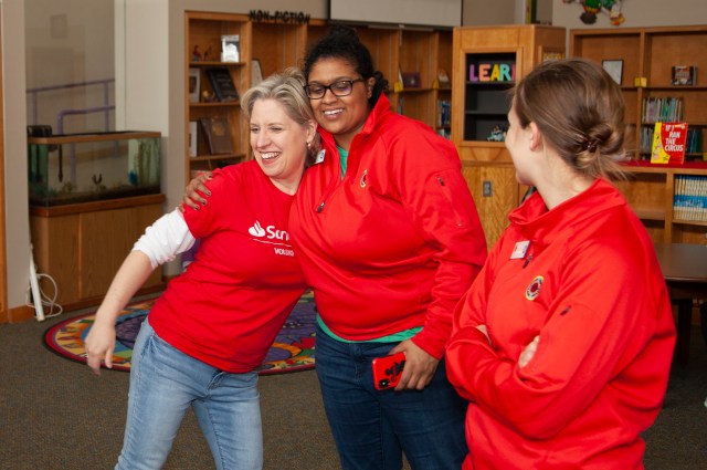 Volunteers hugging